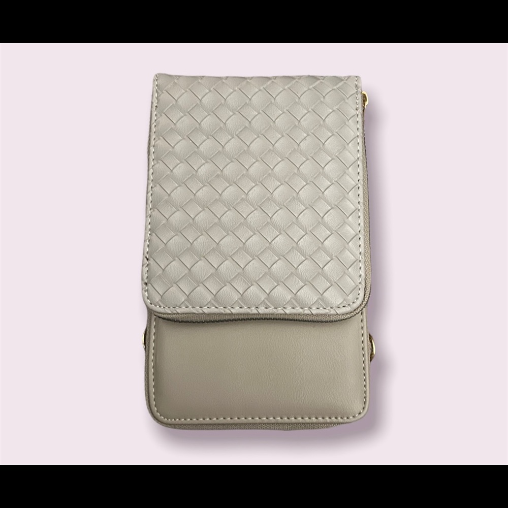 Brand new never used small beige crossbody multi pocket bag.